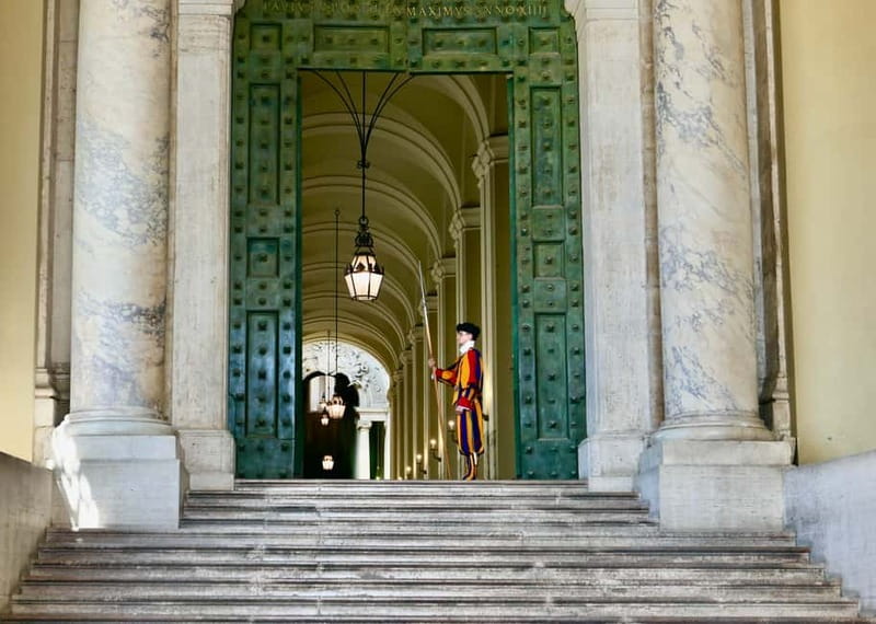 Rome: Guided Tour of St. Peter's Basilica, Grottoes & Square - Seeing Bernini’s great canopy