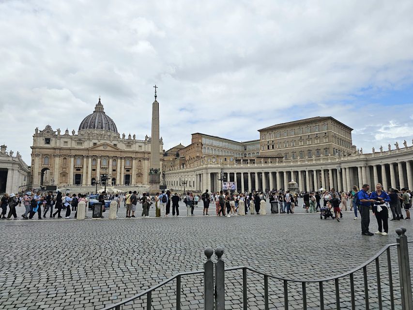 Rome: St. Peter's Basilica, Dome, and Vatican Grottoes Tour - Inside the basilica: marble, gold, and giant scale