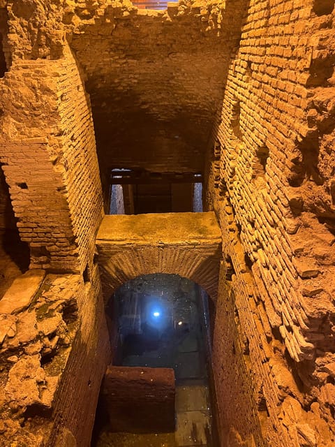 Rome: Trevi Fountain District Underground Tour and Ice Cream - Entering Vicus Caprarius below the Trevi District