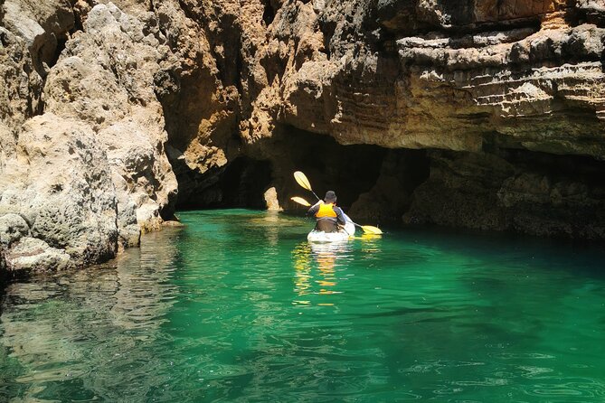 Sagres: Praia Da Ingrina Caves Guided Kayaking Tour - Returning to Praia da Ingrina
