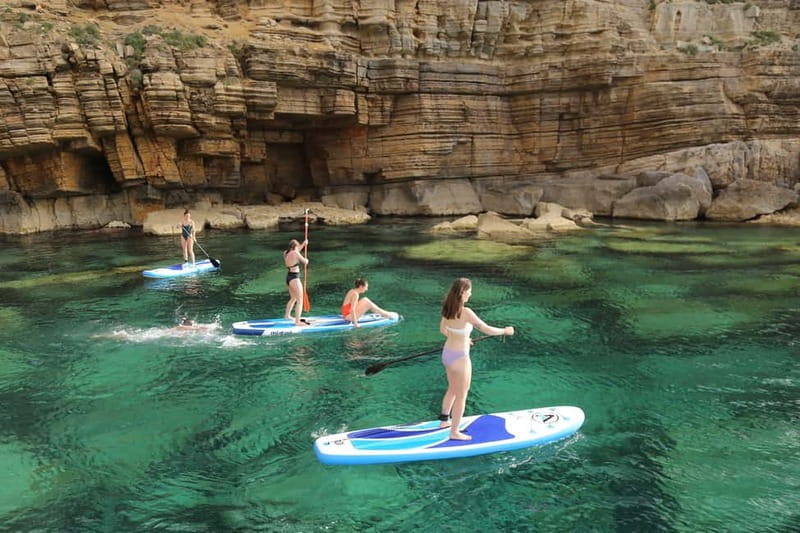 San Antonio: Cala Bassa, Cala Conta and Cave Boat Trip - Food and drinks on board