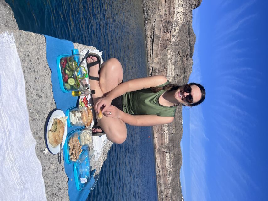 Santorini: Sea Caves Kayak Trip with Snorkeling and Picnic - Entering the blue sea caves
