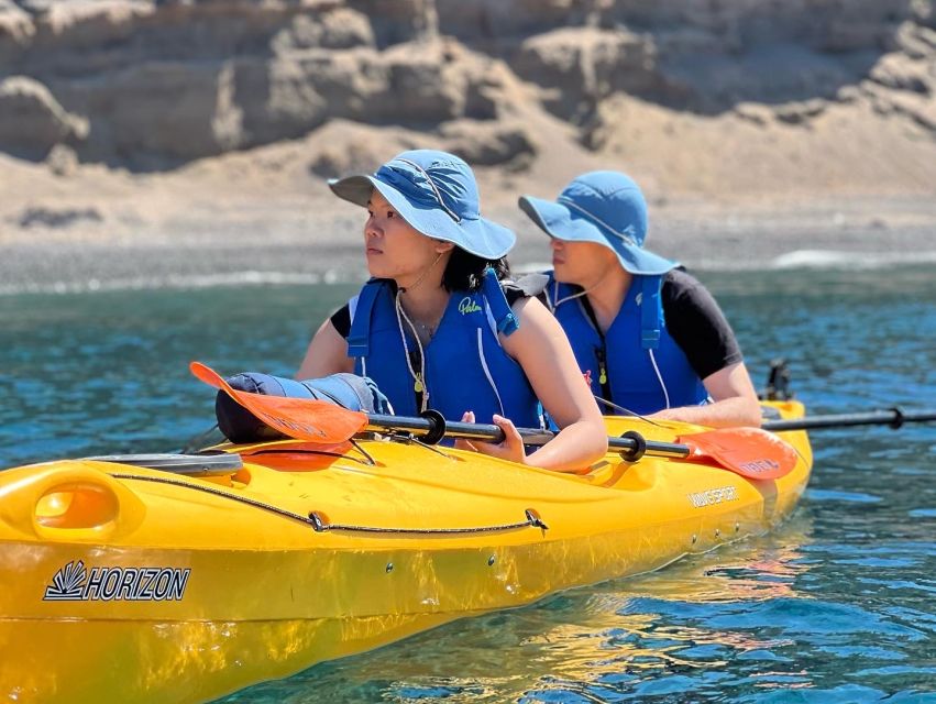 Santorini: Sea Caves Kayak Trip with Snorkeling and Picnic - Black Mountain, snorkeling, and time to rest