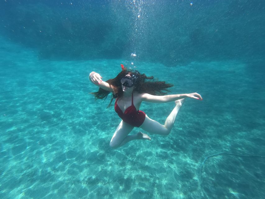 Santorini: Sea Caves Kayak Trip with Snorkeling and Picnic - Pickup, preparation, and the first paddle