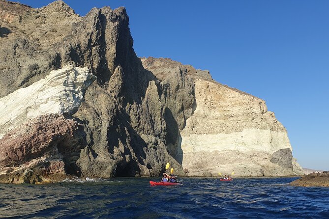 Santorini Sea Kayak - South Discovery, Small Group incl. Sea Caves and picnic - Sunset departures and weather planning
