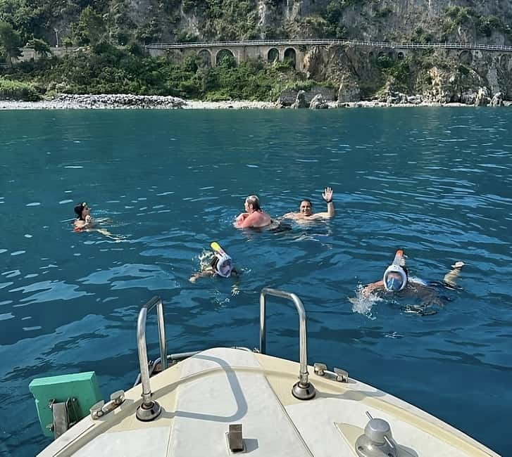 Scilla in Barca-Costa Viola tour: Caves-Cala Janculla - The first swim at Favazzina