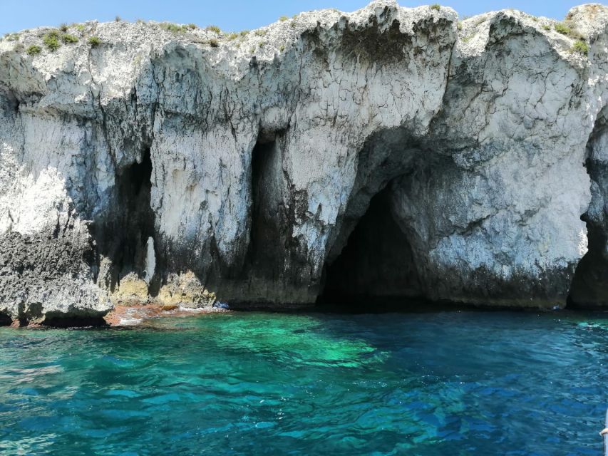 siracusa boat tour with visit to sea caves and ortigiaisland - Under the Umbertino Bridge and into the harbor