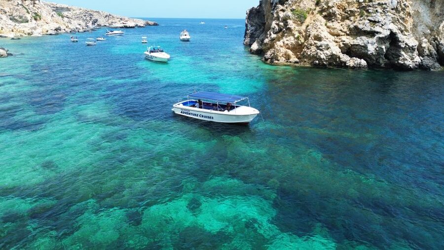 Sliema: Boat Trip to Comino Blue Lagoon, Gozo, and Caves - Caves along Comino’s limestone coast
