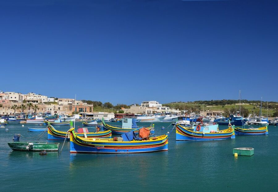 Southern Malta: Blue Grotto, Hagar Qim, and Marsaxlokk Tour - Marsaxlokk, luzzu boats, and a proper food stop