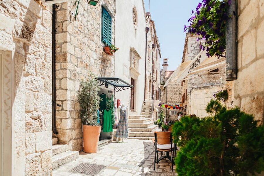 Split: Blue Cave, Vis & Hvar Full-Day Trip by Speedboat - Stiniva Cove, dramatic cliffs and a short swim