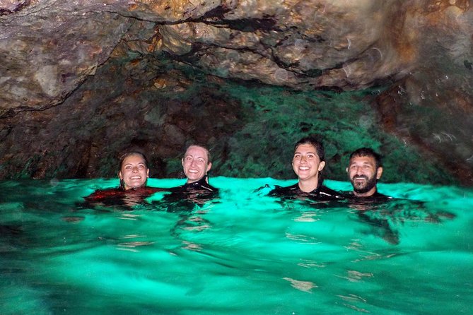 SUP Tour in Algarve Ingrina Caves w/ Snorkeling & Photos Included - Swimming and snorkeling inside the smaller caves