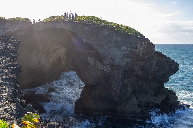 Taino Indian Cave, Arecibo Hike and Beach Tour from San Juan - Hiking the coastal rock to Cueva del Indio