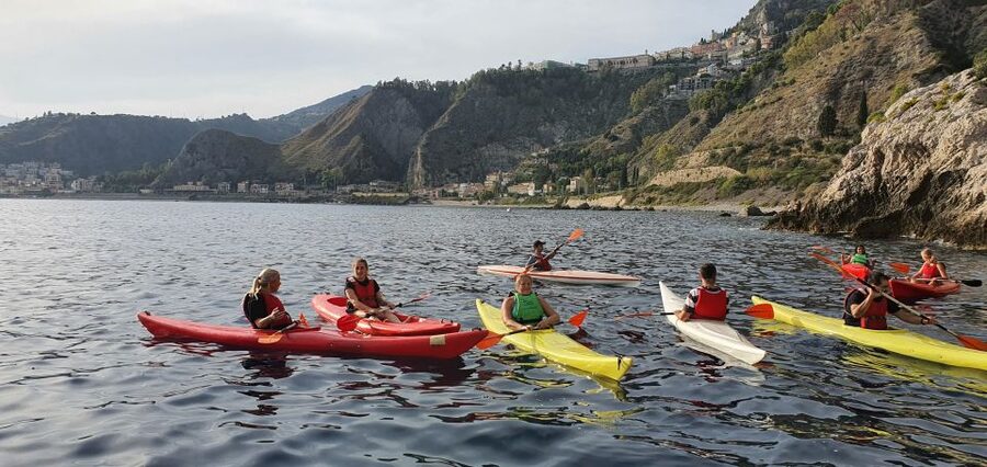 Taormina: Kayak Coastal Tour to Isola Bella and Blue Grotto - What the guide adds to the experience