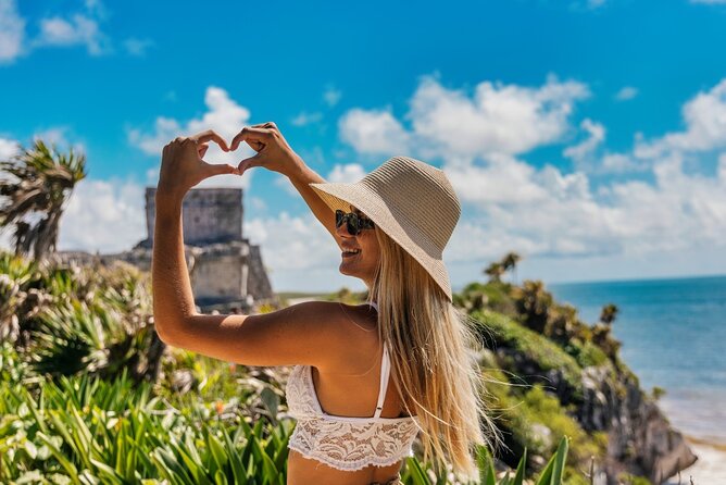 Tulum Day Trip Mayan Ruins and Cenote Swim - Walking through Tulum’s ancient port city