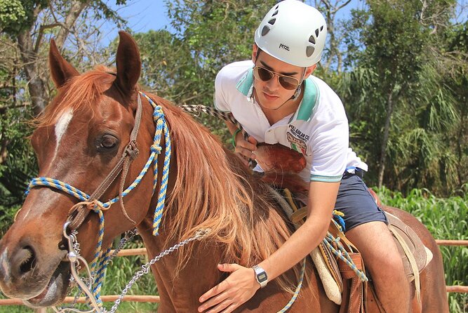 Tulum Jungle Horseback Ride + ATV + Ziplines + Cenote Combo Tour - ATV riding through dust, mud, and rough jungle roads