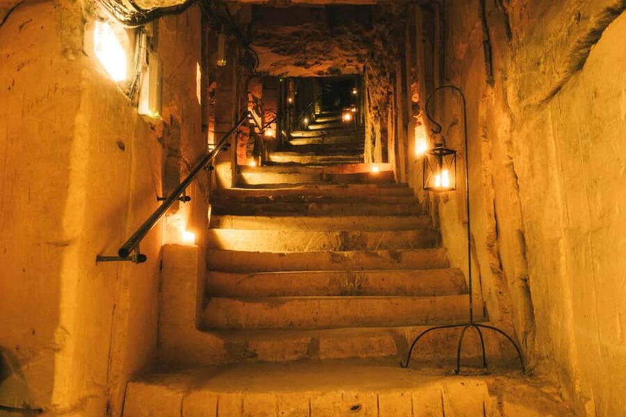 Valkenburg: Cave Biking Underground Bike Tour - What you see in the dark tunnels