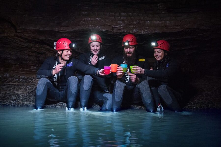 Waitomo Caves Black Abyss Ultimate Caving Experience - Cold water and the wetsuit reality
