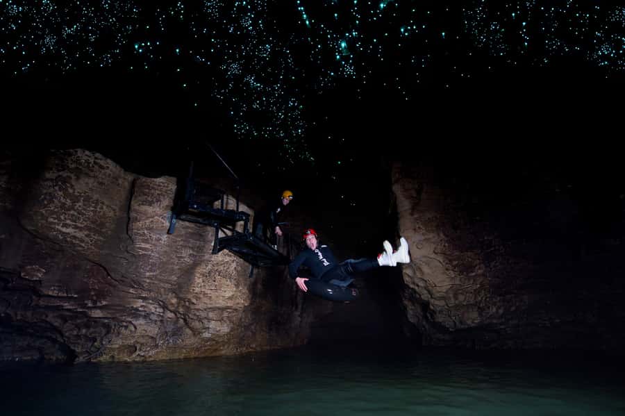 Waitomo Caves: Labyrinth Black Water Rafting Experience - The underground river and the final return to daylight
