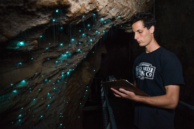 Waitomo Glowworm Caves Guided Tour - Boarding the underground boat