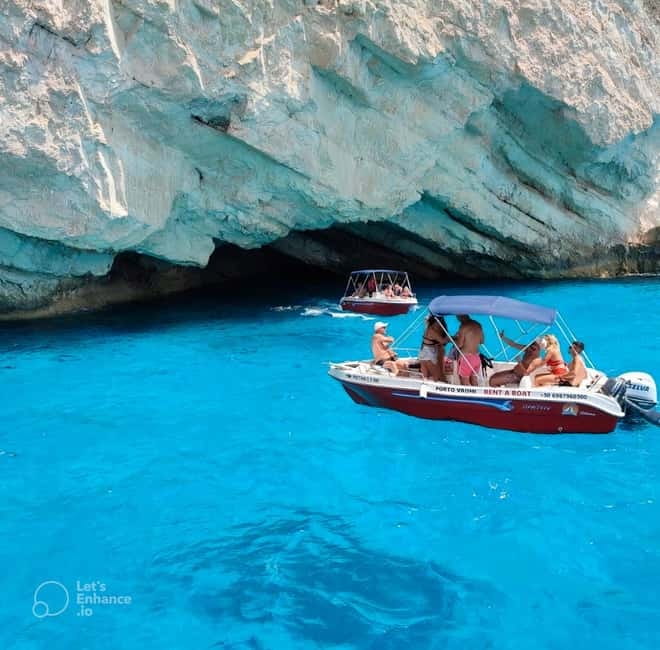 Zakynthos: Shipwreck & Caves Private Boat Tour with Skipper - Starting beneath the yellow umbrella