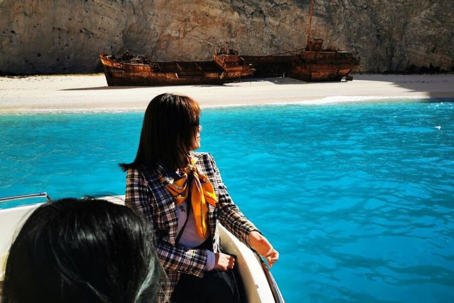 Zakynthos Small Group Tour Shipwreck & Blue Caves Land & Sea - Navagio Viewpoint shows the beach from above